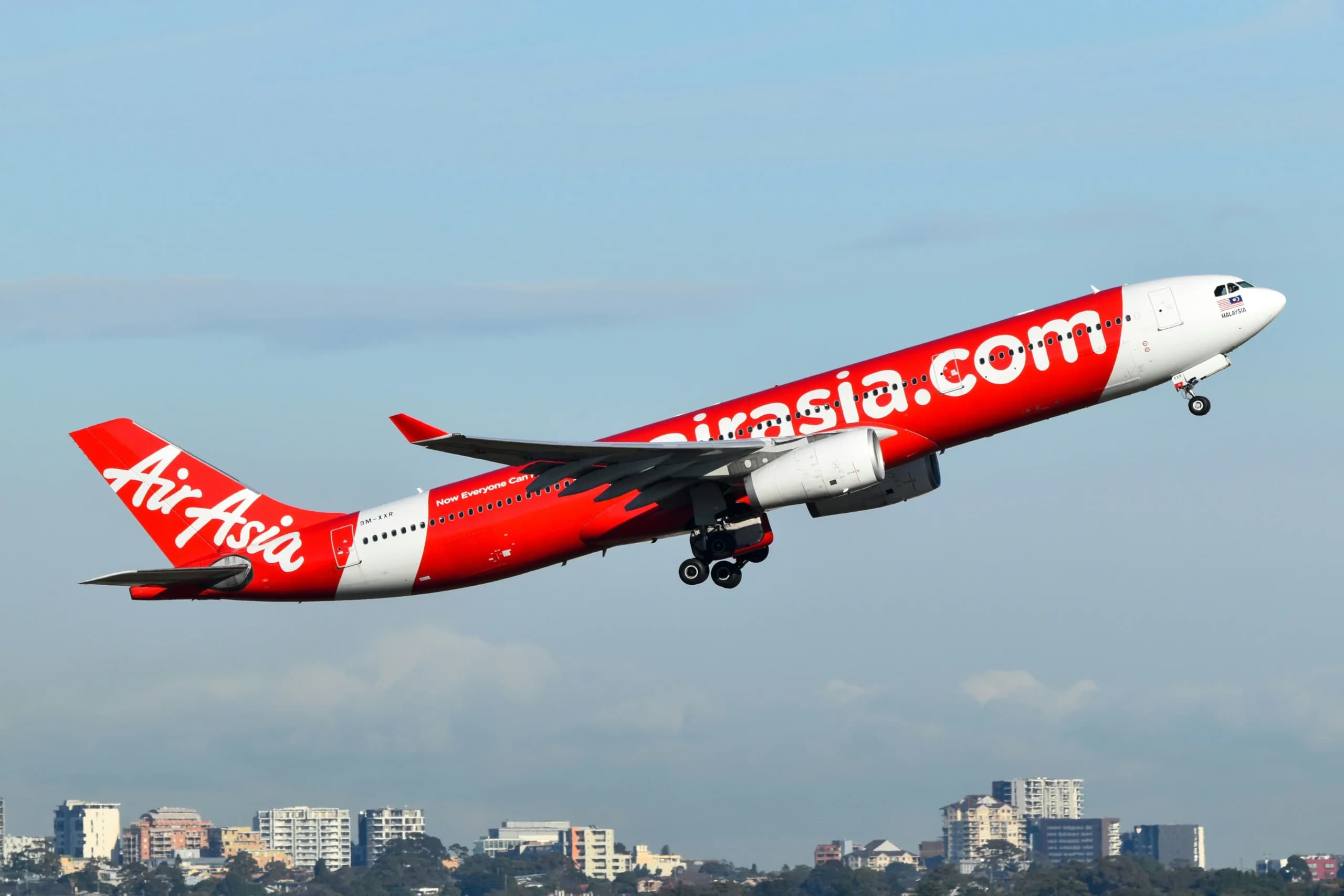 Pesawat Maskapai Air Asia. (Sumber: Unsplash/David Syphers) Pesawat Maskapai Air Asia. (Sumber: Unsplash/David Syphers)