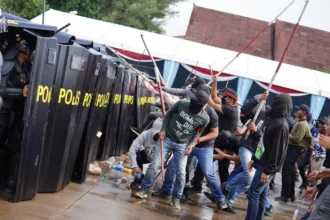 Ilustrasi petugas Kepolisian saat mengamankan aksi