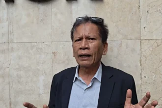 Damai Hari Lubis melaporkan kuasa hukum Roy Suryo, Khozinudin.