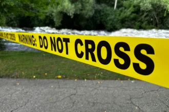 Ilustrasi garis polisi. (Sumber: Unsplash/ Ted Balmer)