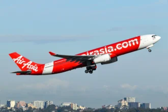 Pesawat Maskapai Air Asia. (Sumber: Unsplash/David Syphers)