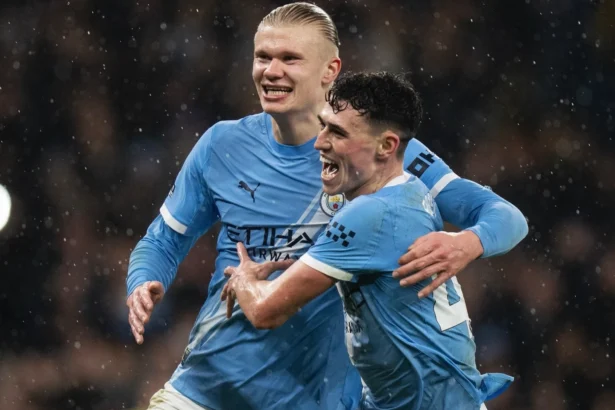 Selebrasi dua pemain Manchester City, Phil Foden dan Erling Haaland.