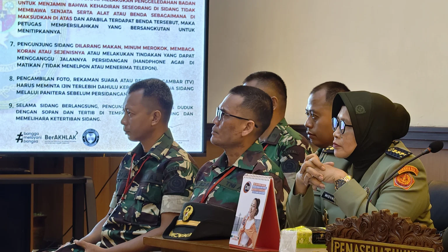 Wajah empat terdakwa kasus penyiraman air keras Wakil Koordinator KontraSsAndrie Yunus.