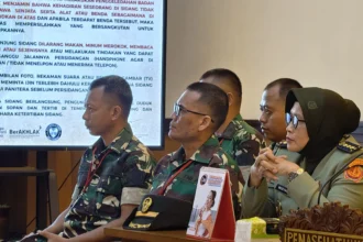 Wajah empat terdakwa kasus penyiraman air keras Wakil Koordinator KontraSsAndrie Yunus.
