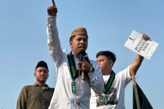 Chairul Ulum, Ketua Badko HMI MPO Jabodetabek, dalam aksi pada 19 Juni 2026.