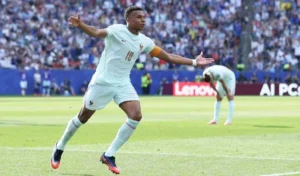 Penyerang Timnas Prancis Kylian Mbappe selebrasi usai cetak gol.