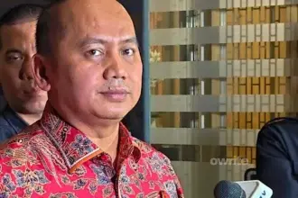 Kapuspenkum Kejagung Anang Supriatna memberikan keterangan pemeriksaan dugaan korupsi eks Jampidsus Febrie Adriansyah. (Sumber: Owrite/Rahmat Baihaqi)