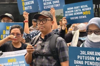 Kospi dan koalisi sipil gelar aksi di depan Gedung DPR, Senayan, Jakarta.