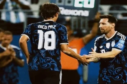 Gelandang Nico Paz dan Lionel Messi.